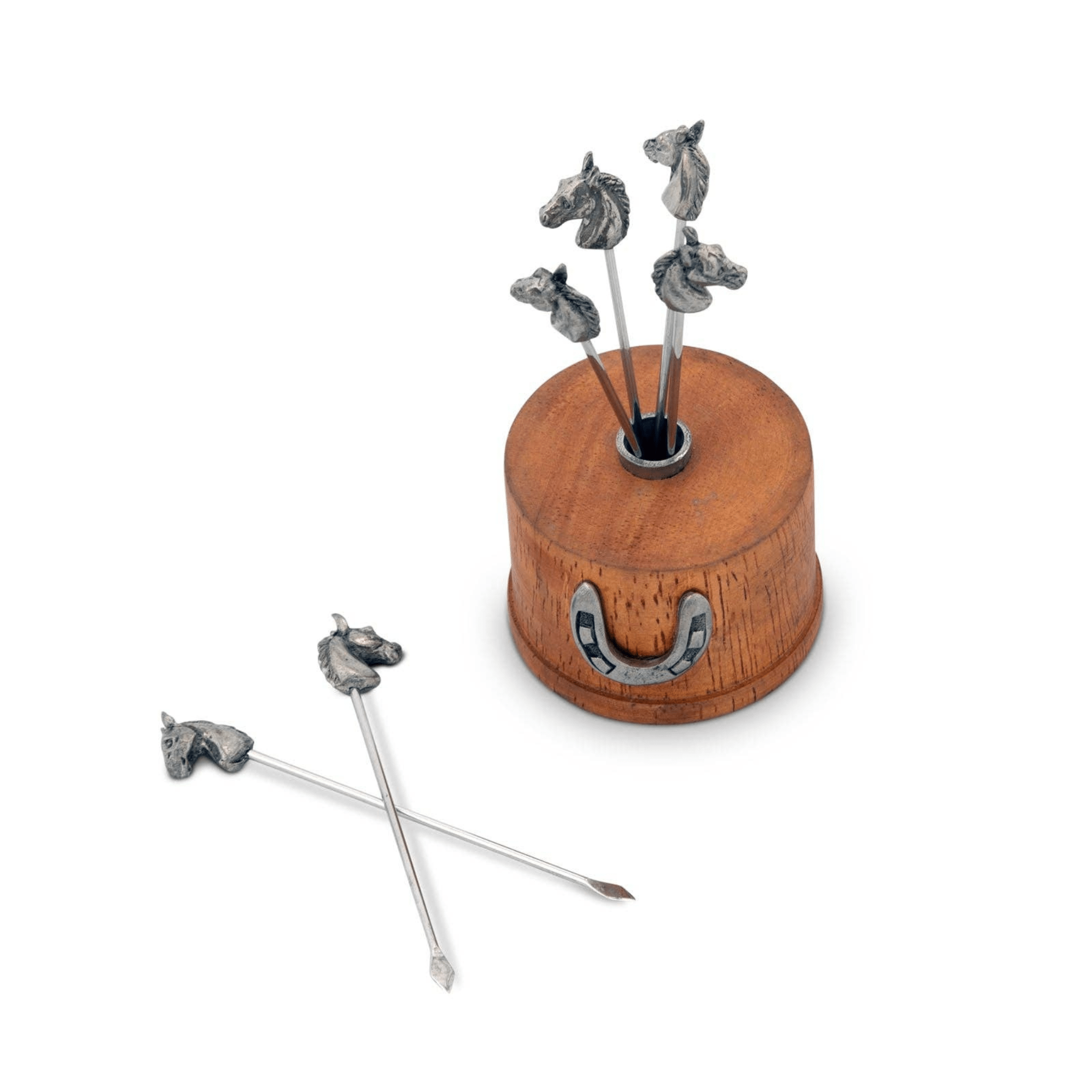 Wooden holder with metal horse-shaped picks on a white background