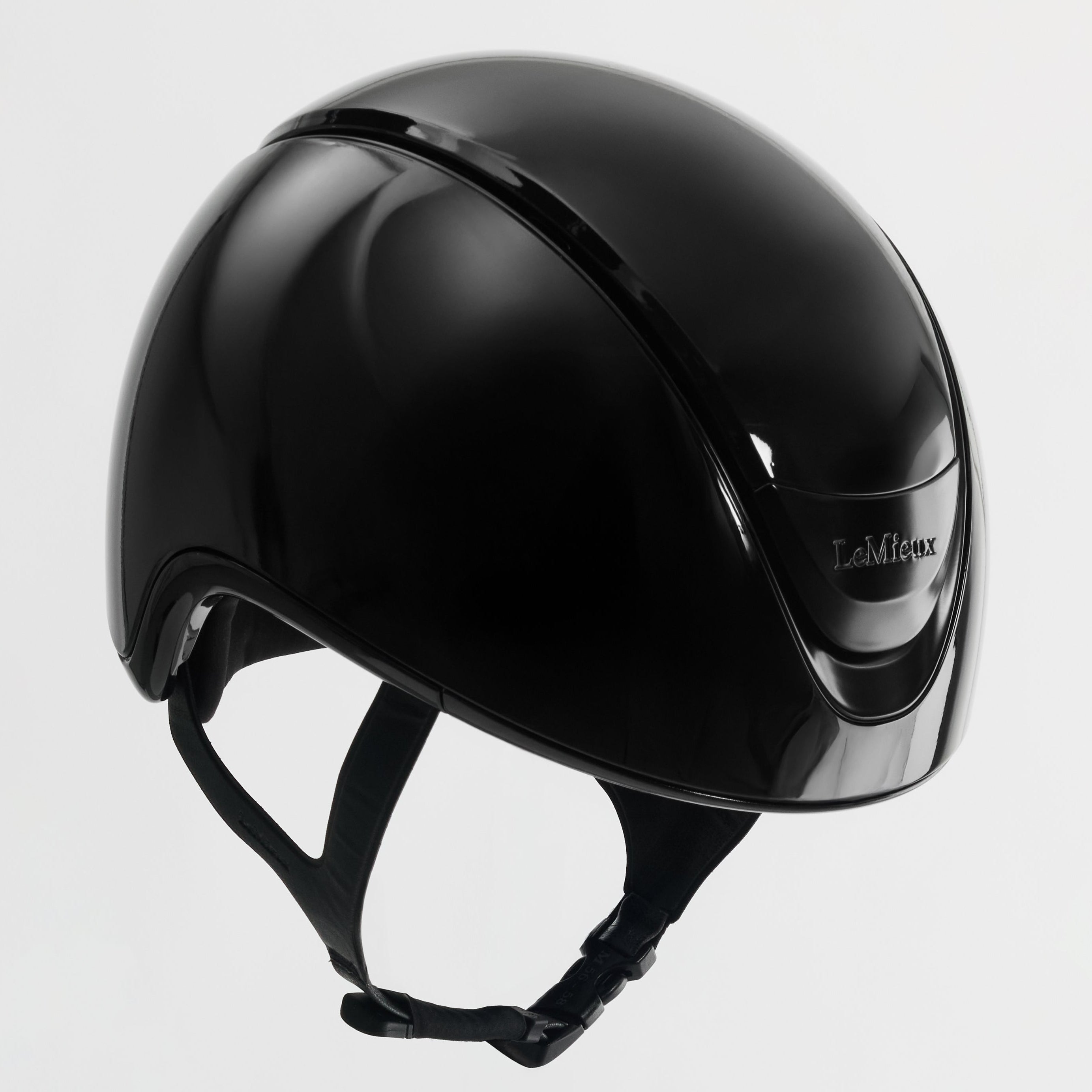 Black helmet with visible brand logo on a light gray background