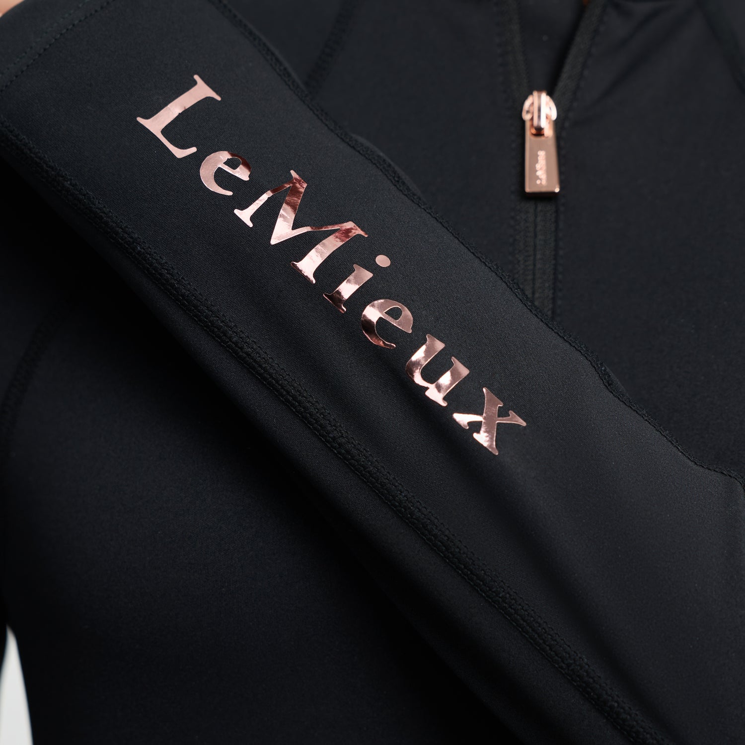 Black jacket with 'LeMieux' logo on a white background