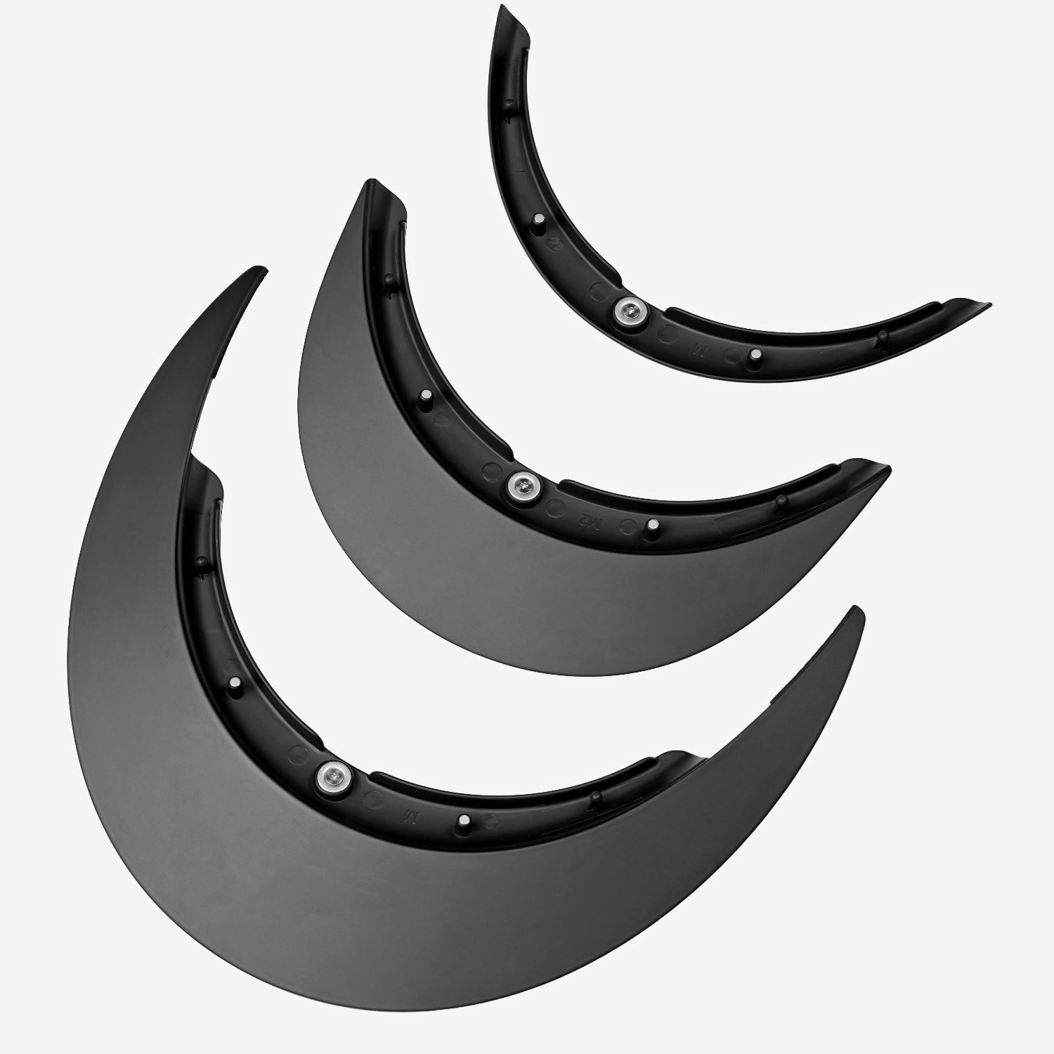 Set of black wheel archliners on a white background
