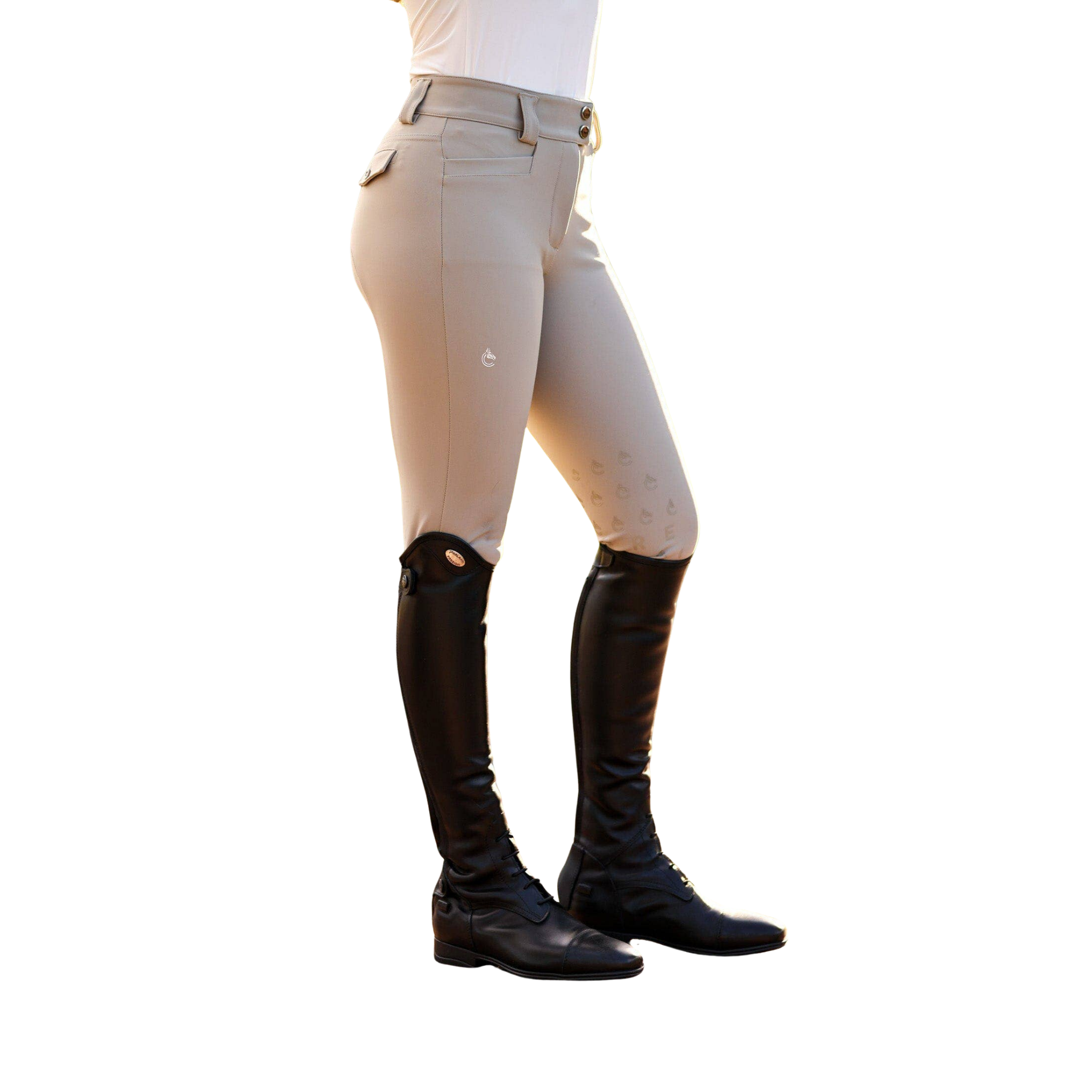 Beige equestrian riding breeches shown on a model from the waist down, paired with black leather riding boots against a plain white background.