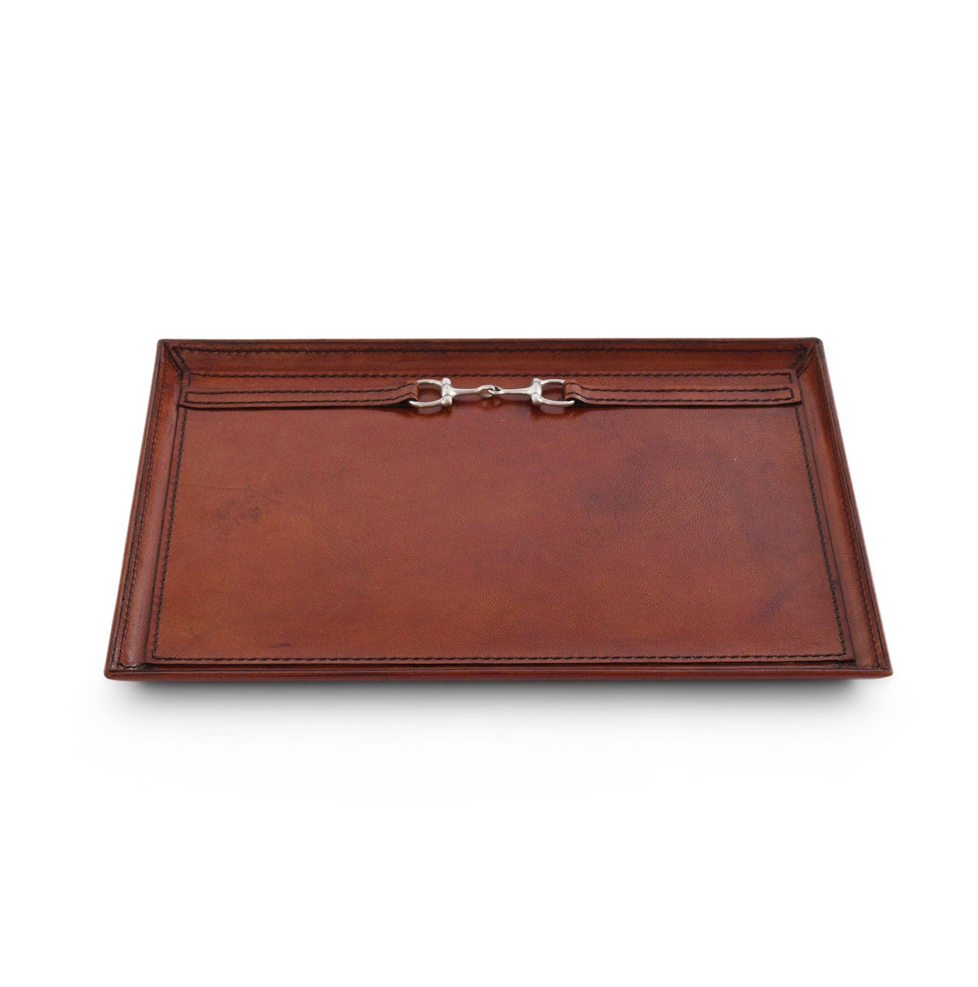 Brown leather tray with a metallic bit on a white background
