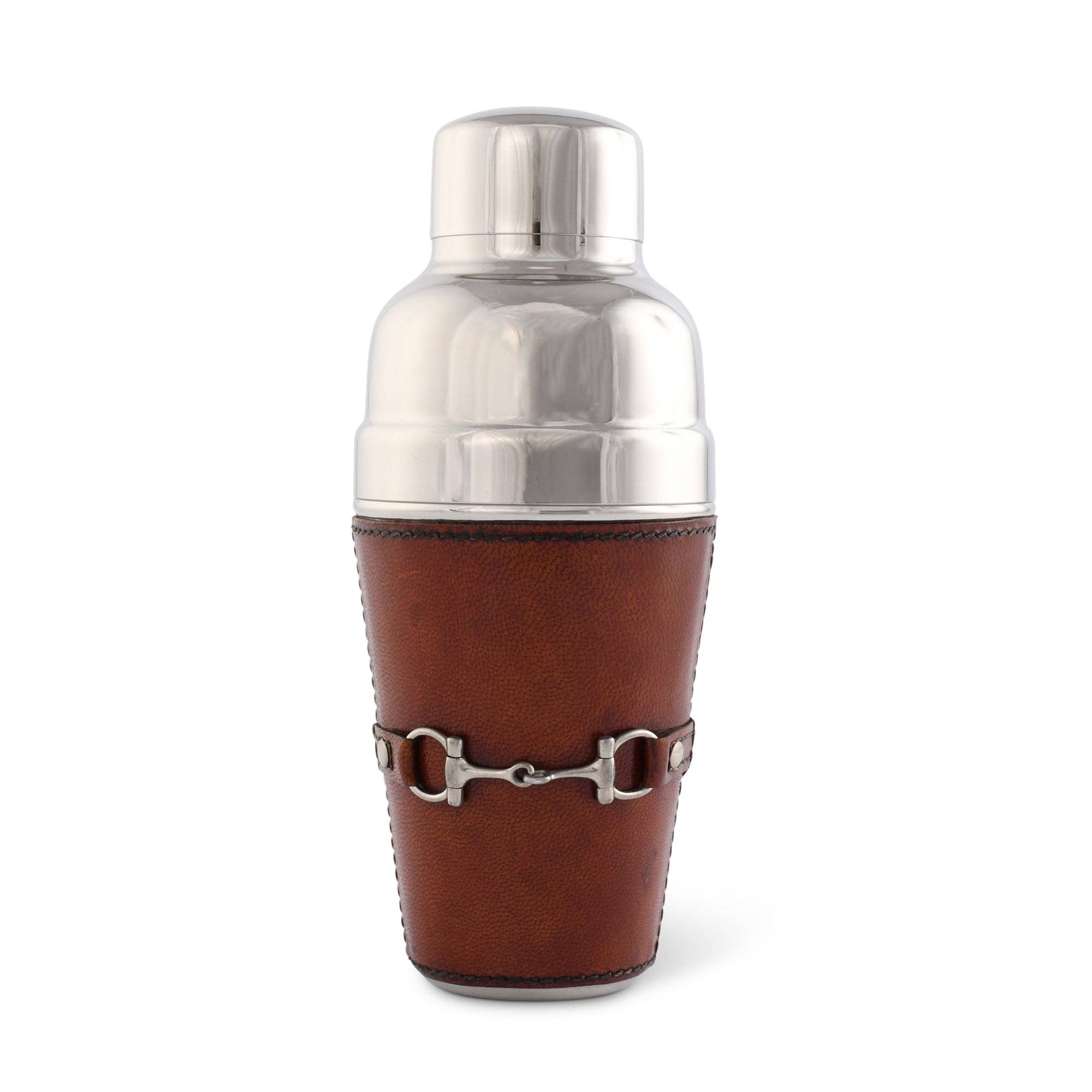 Cocktail shaker with brown leather wrap and silver bit accent on a white background