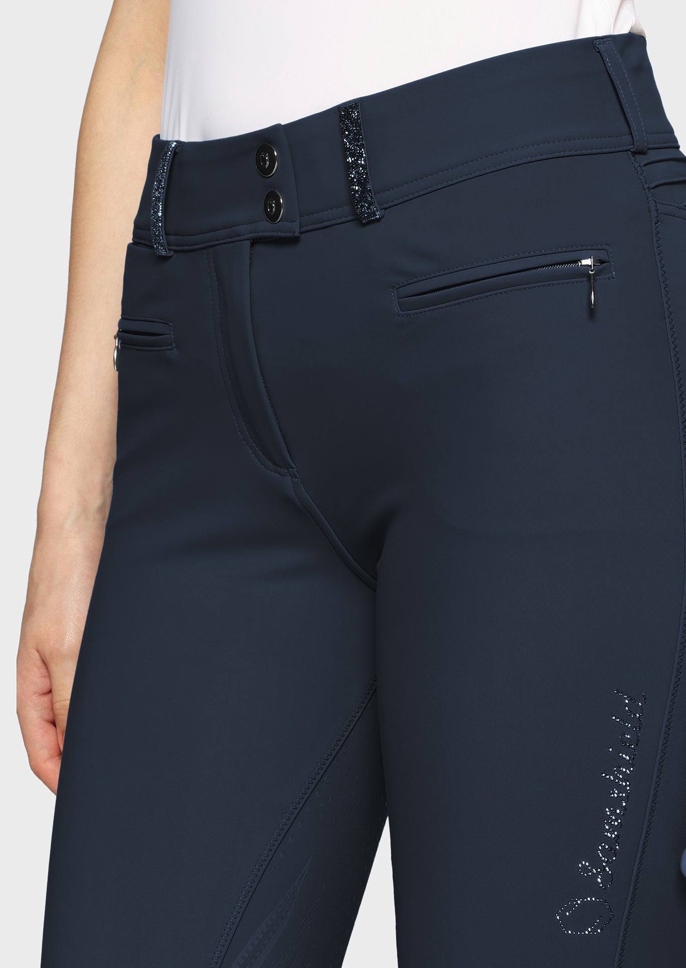 Navy riding pants with a brand logo on a white background