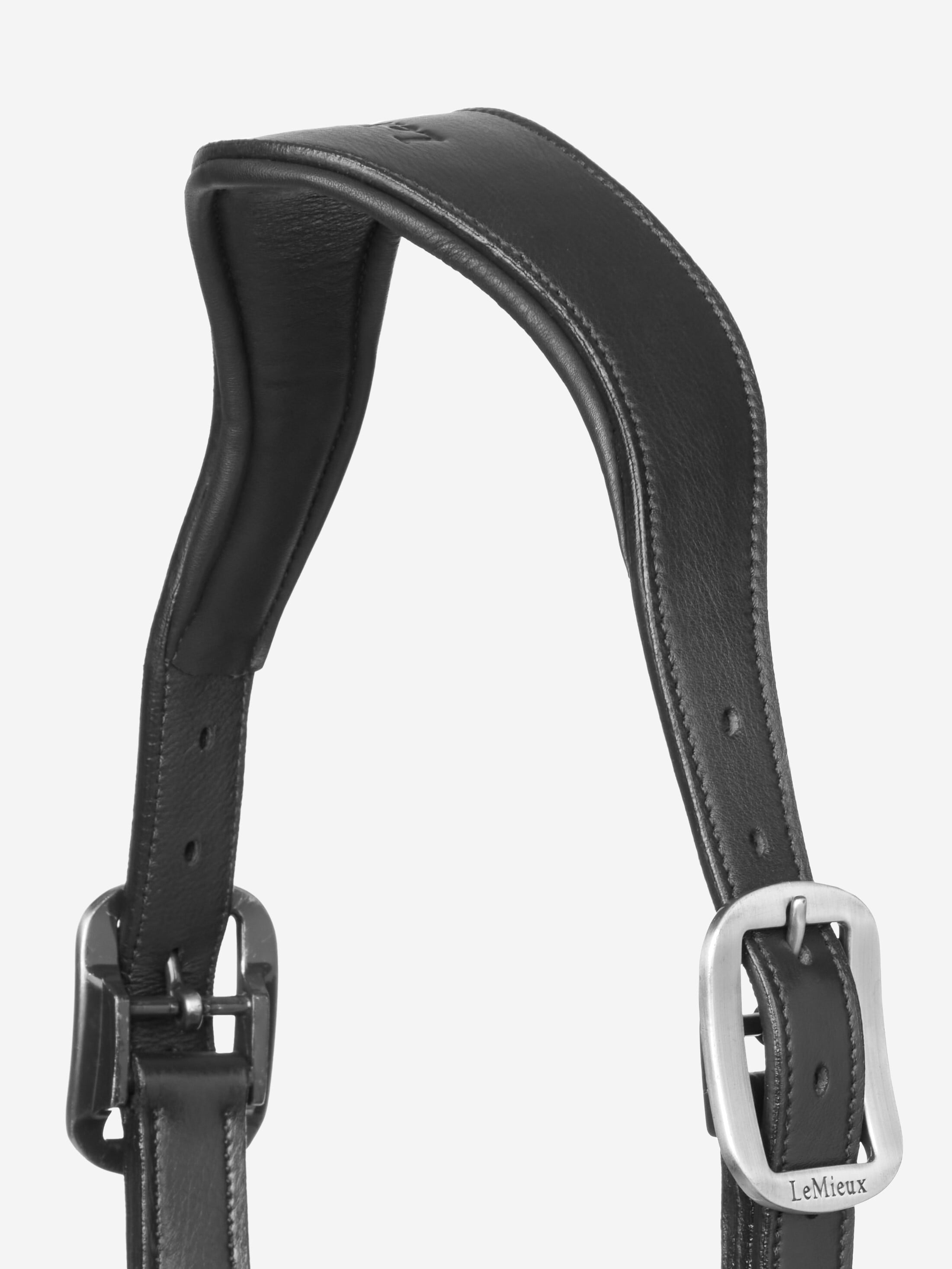 Black leather strap with silver buckle on a white background