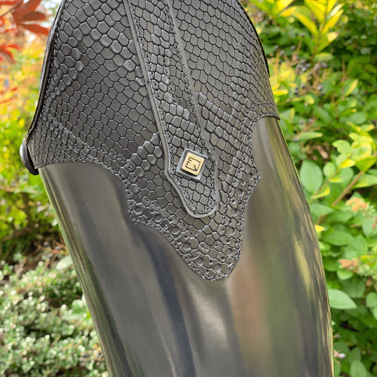 dressage riding boot on stump grey leather with black patent and black python details