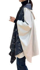 Black / White Horse Bit Reversible Rain Cape