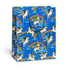 Gift bag with unicorn and rainbow pattern on a blue background