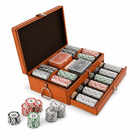 An open orange-brown leather poker chip set in a matching case, with multiple drawers and compartments holding stacks of chips in red, green, black, and white. Several loose chips are placed in front on a clean white background.
