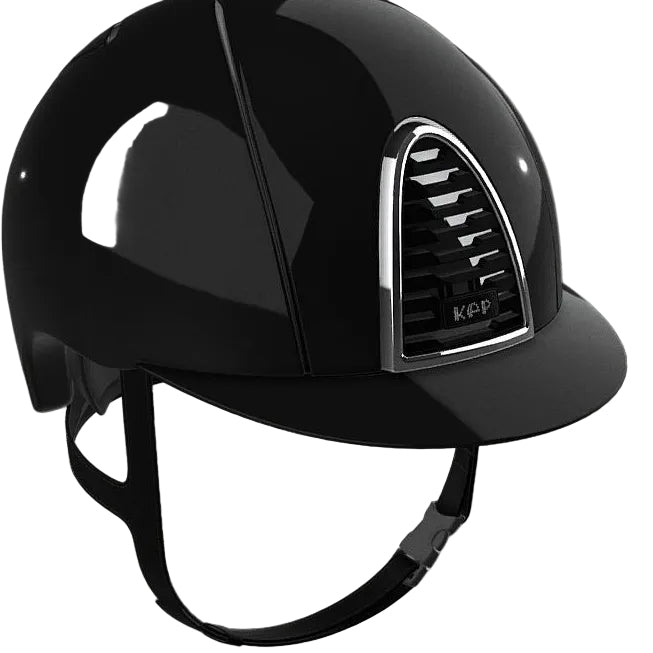 A glossy black equestrian riding helmet with a curved brim and a silver-trimmed vent on the side, shown against a white background.