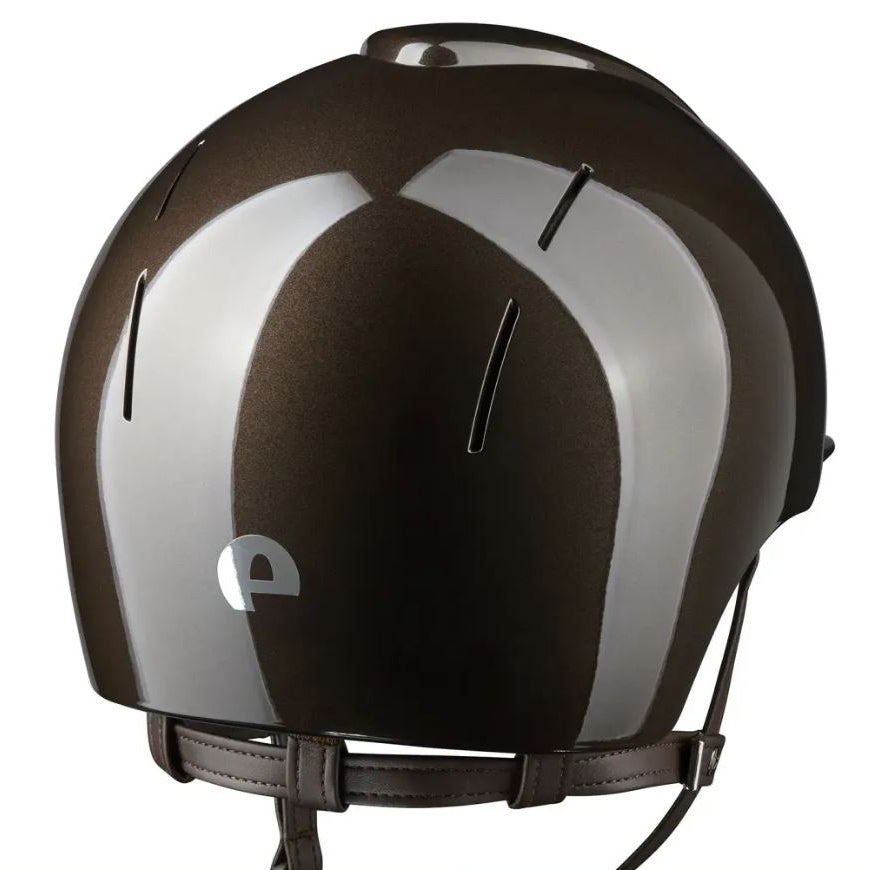 A glossy dark brown KEP helmet shown from a three-quarters rear view on a white background.