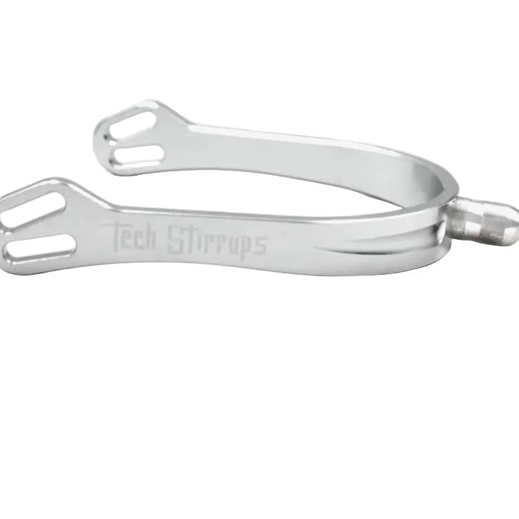 A silver equestrian spur with the brand name 'Tech Stirrups' engraved on the side, shown against a white background.