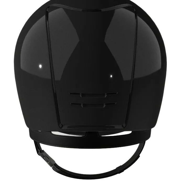 A black riding helmet facing away, with a white background.