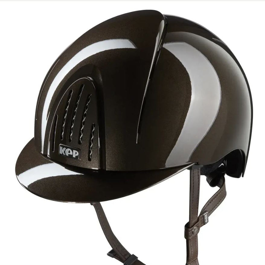 Brown glossy helmet, brown straps and KEP logo.