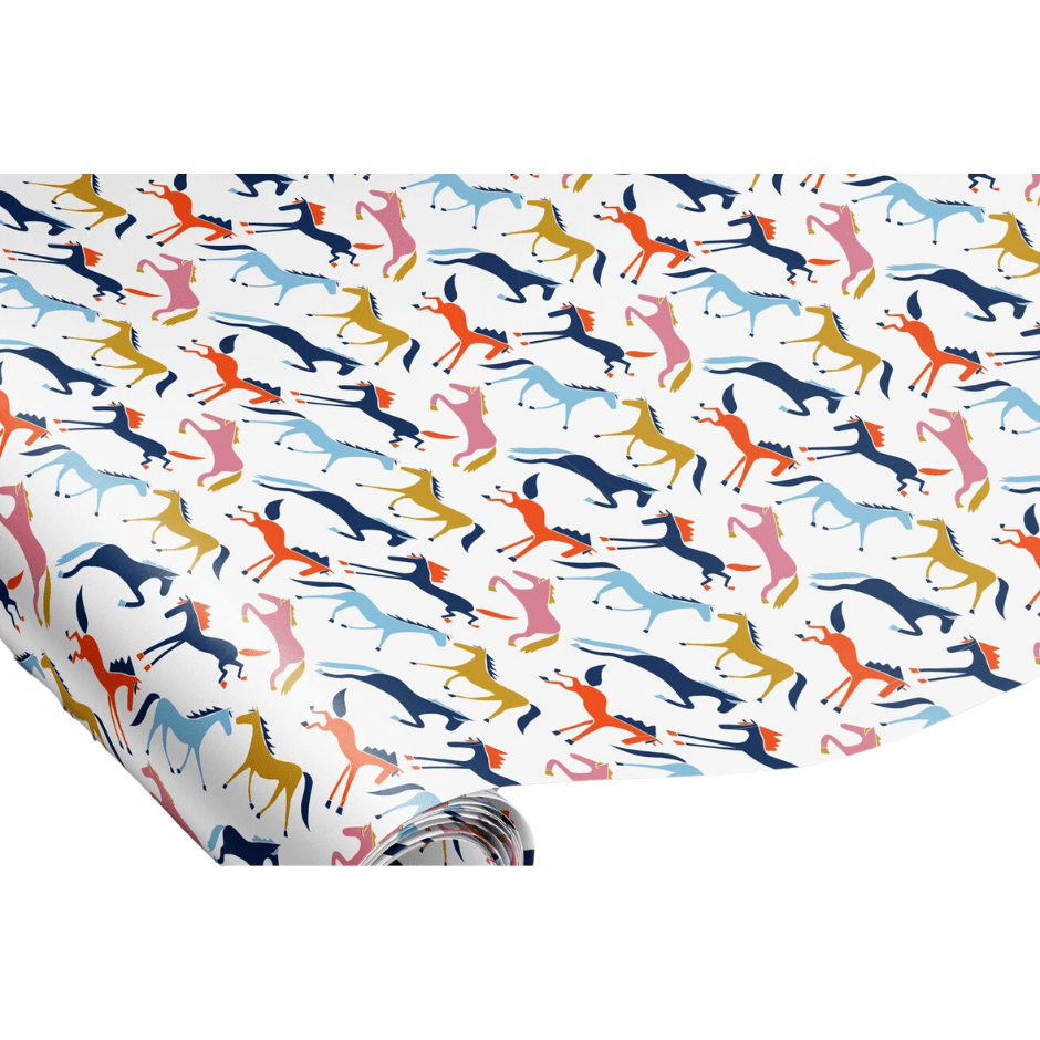 Channing Wrapping Paper. Colorful horses on white background.