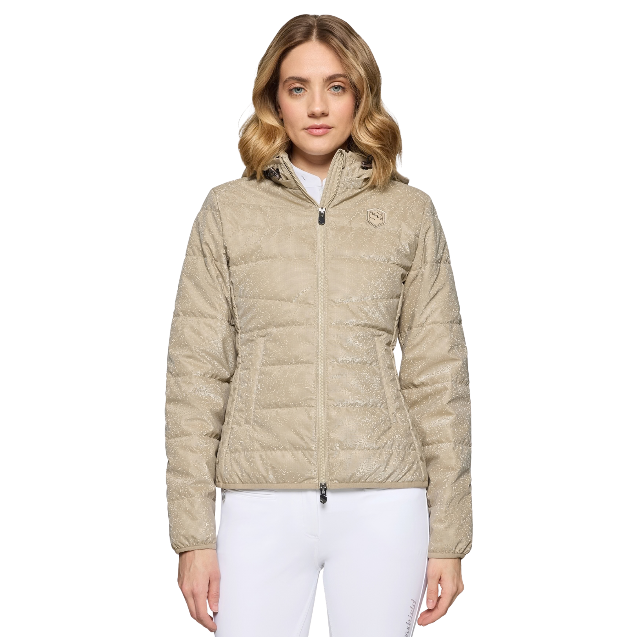 Woman wearing a beige quilted jacket on a white background