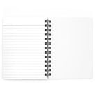 Notebook with spiral binding on a white background