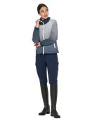 Person wearing a gray and blue equestrian outfit with black boots on a white background