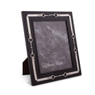 Black photo frame with silver horse bit accents on a white background