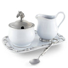 Silver and white ceramic sugar bowl, creamer, and tray set on a white background