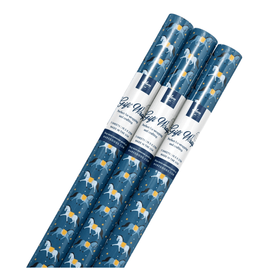 Dressage Pony Wrapping Paper. Blue background with white and blue horses, yellow stars, and white dots.