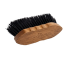 Wooden brush with black bristles on a white background