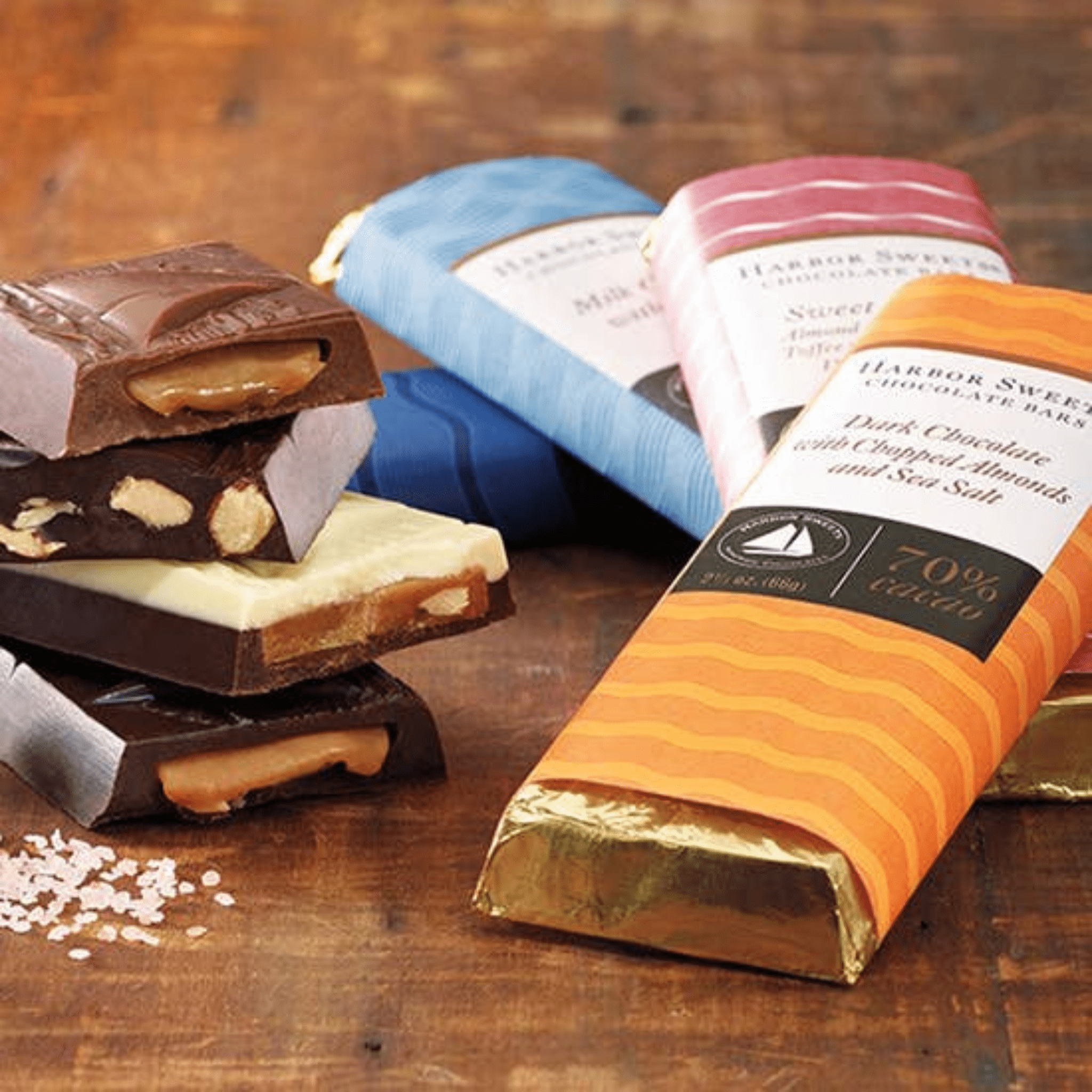 Harbor Sweet chocolate bars on a wooden surface with visible branding.