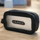 Black and white bag with 'Olson's' branding.