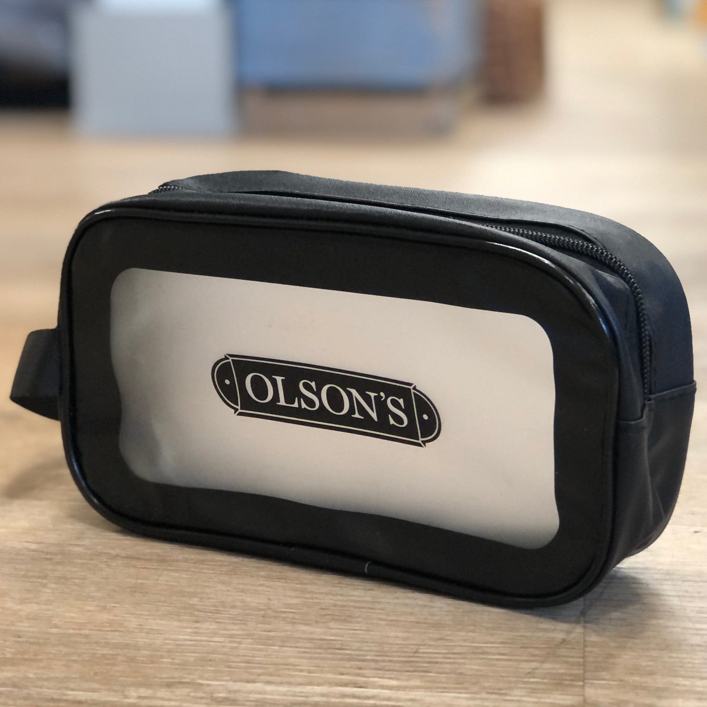 Black and white bag with 'Olson's' branding.