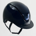 Black riding helmet on a light gray background
