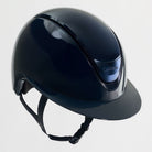 Black riding helmet on a light gray background