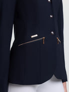 Navy blue blazer with gold zipper and buttons on a white background