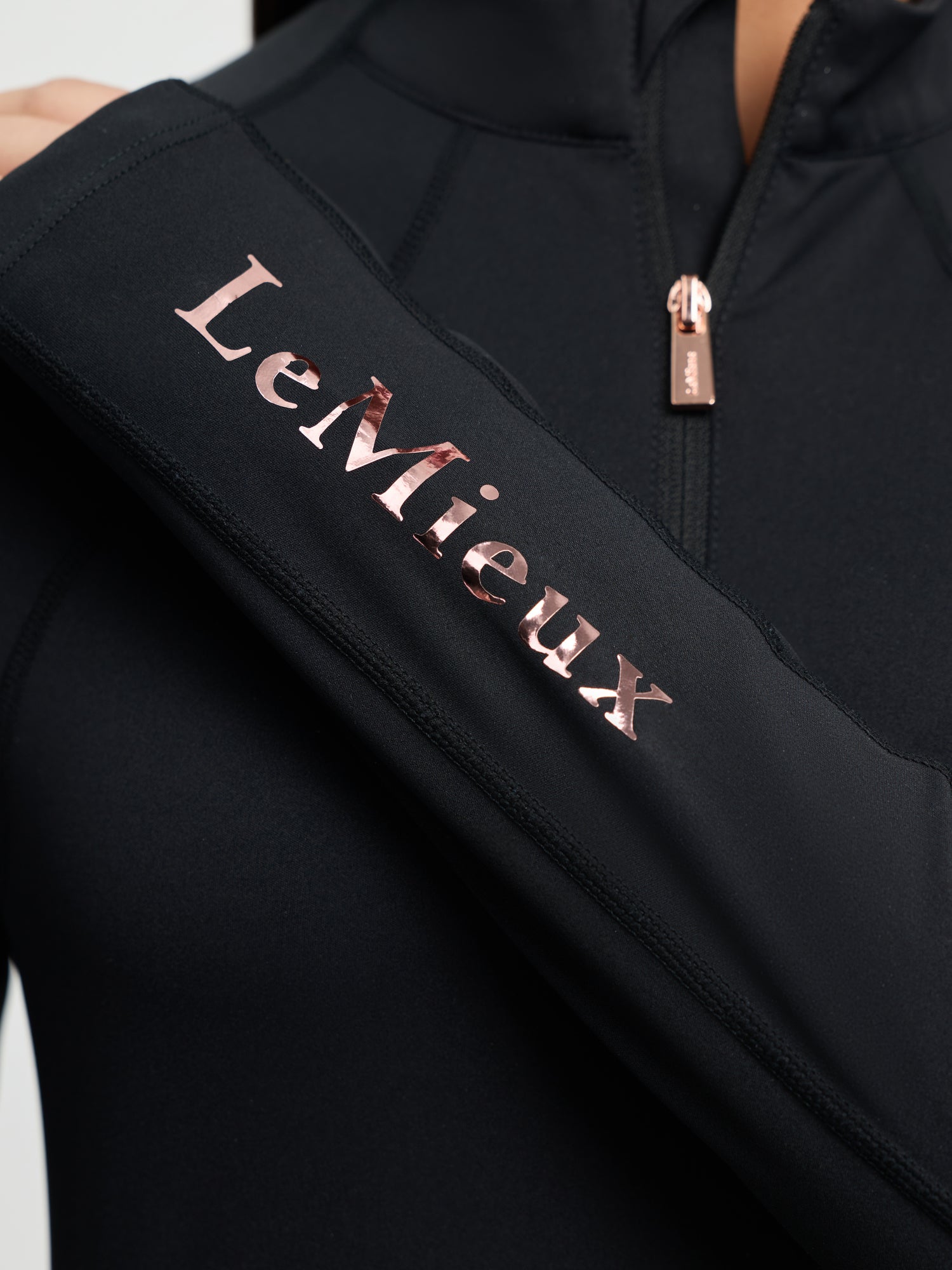 Black jacket with 'LeMieux' logo on a white background