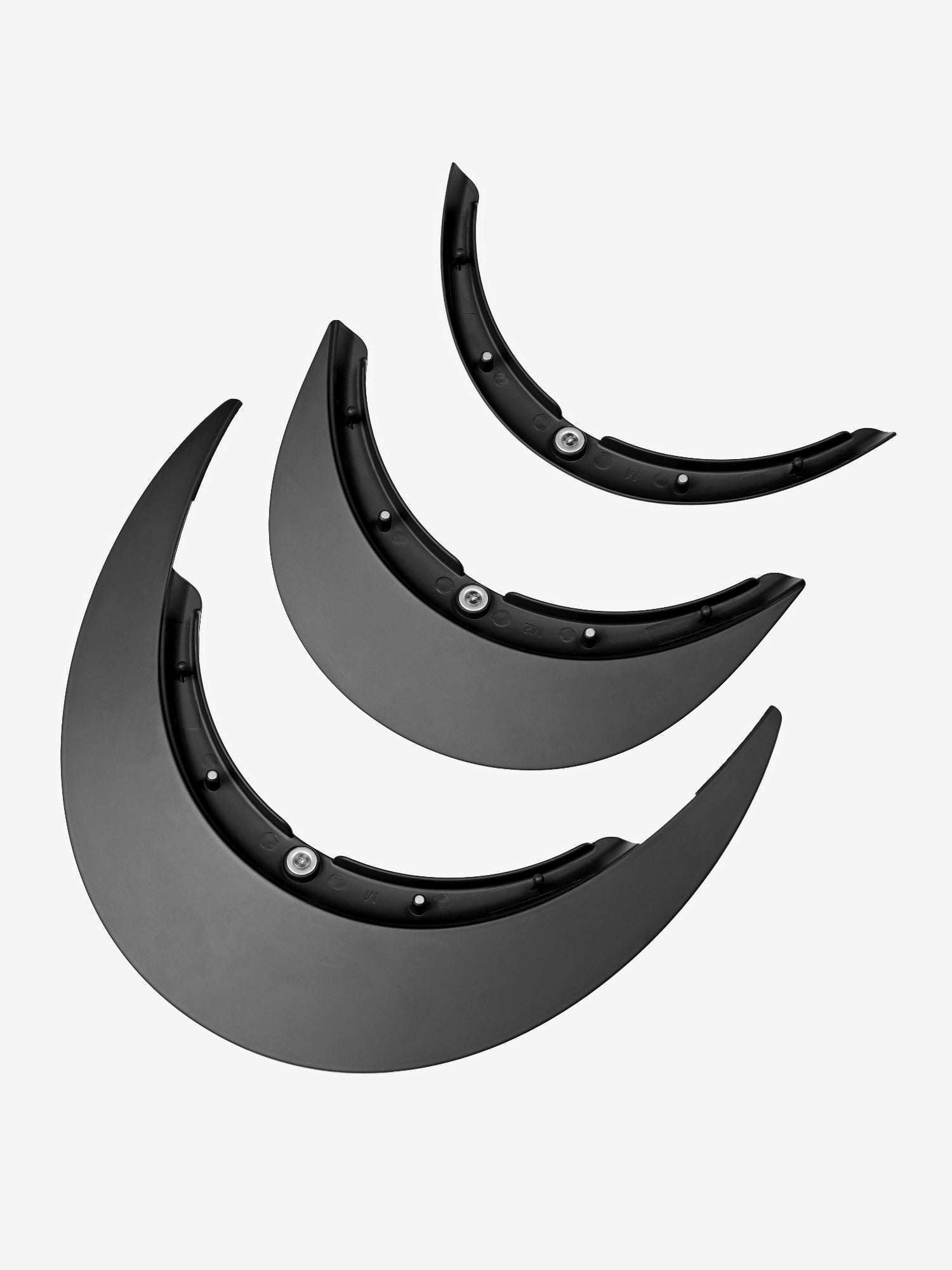 Set of black wheel archliners on a white background