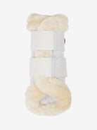 White bandage with beige fur-like material on a white background