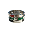 Stack of colorful metal bracelets on a white background