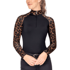 Black top with leopard print sleeves worn by a person on a white background