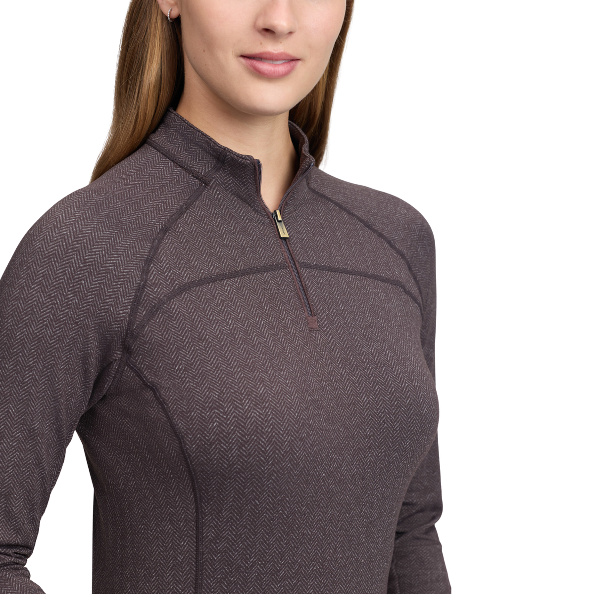A close-up of a woman wearing a dark brown textured quarter-zip pullover, showing the collar, zipper, and chest panel details against a plain white background.