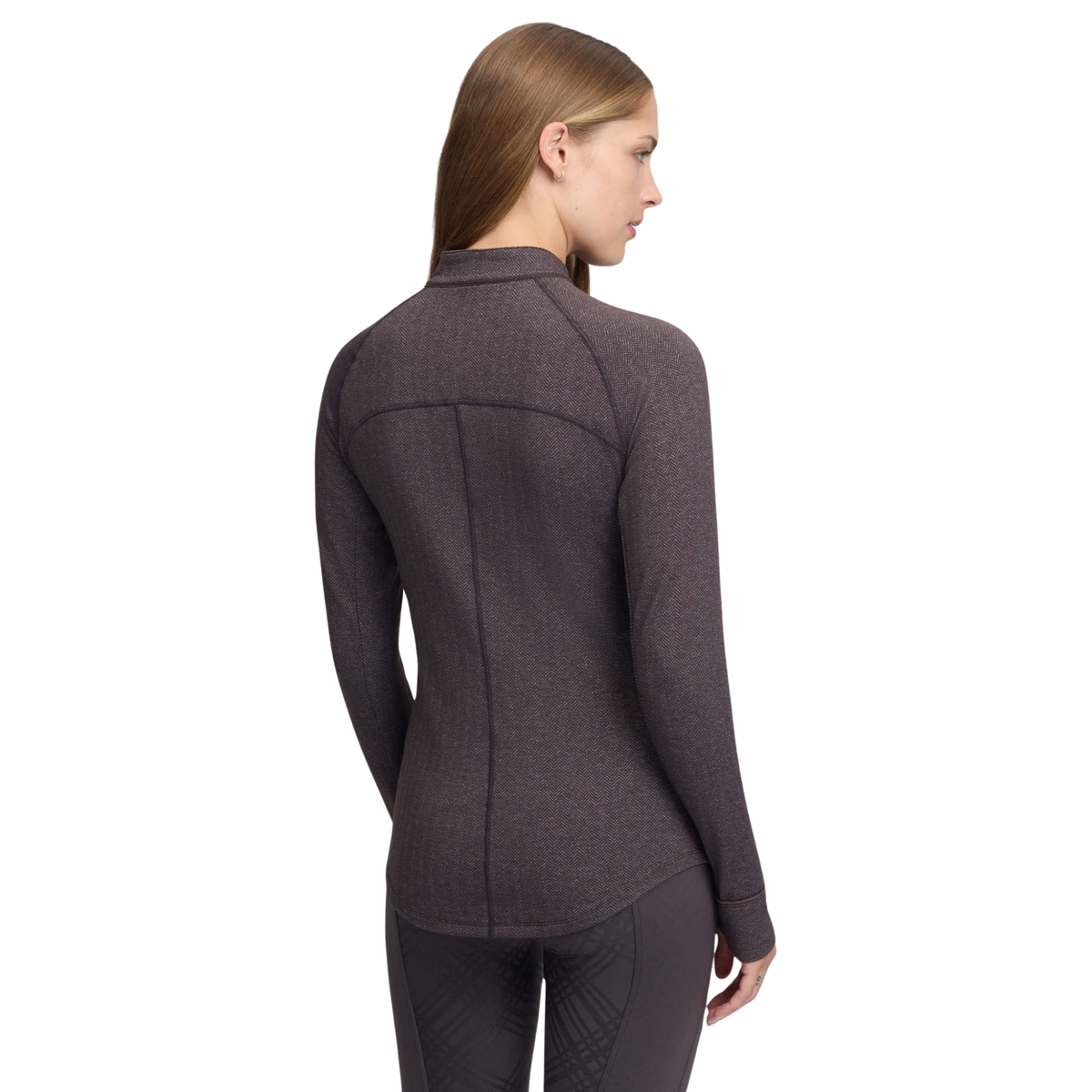 A woman shown from the back wearing a dark heather gray long-sleeve equestrian jacket and matching dark riding breeches against a plain white background.