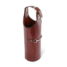 Brown leather umbrella stand with silver hardware on a white background