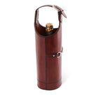 Brown leather wine bottle holder with a cork on a white background