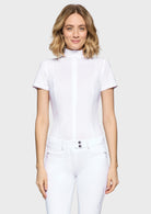 Woman wearing a white short-sleeve shirt and pants on a white background