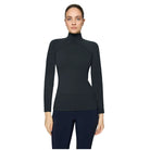 A woman modeling a black long-sleeve mock neck athletic top with a subtle curved seam detail at the waist, paired with dark leggings, against a light gray background.