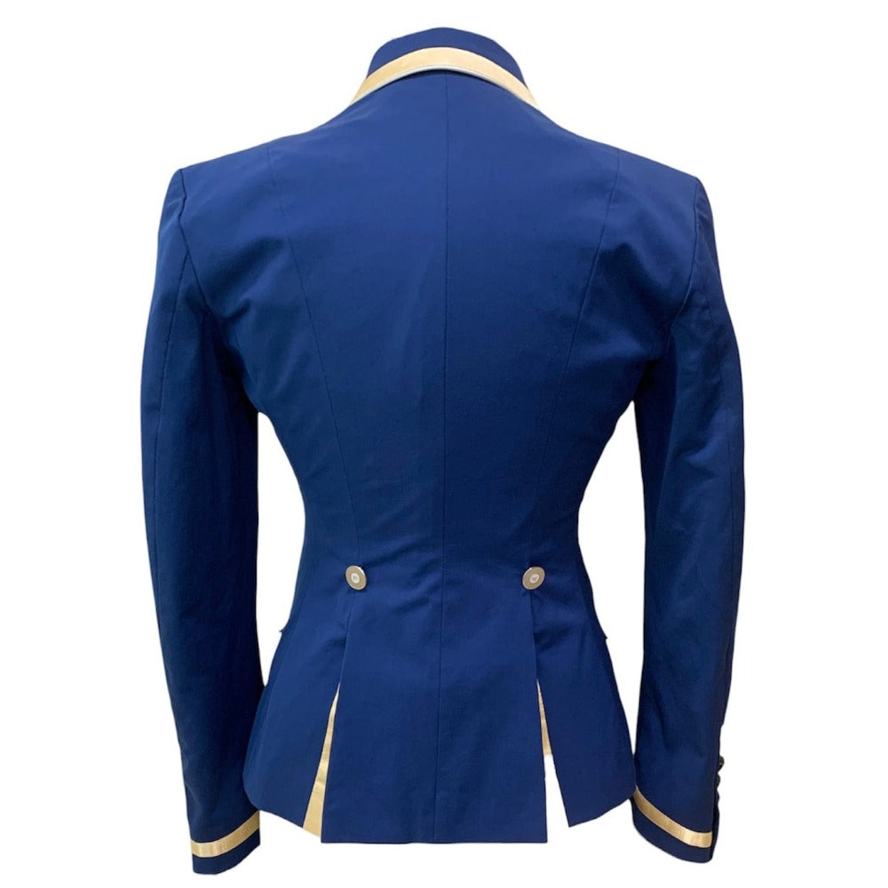 Blue show coat against a white background