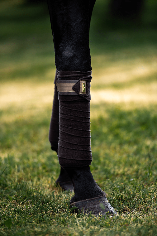 equestrian stockholm polo bandages - golden brown on horse