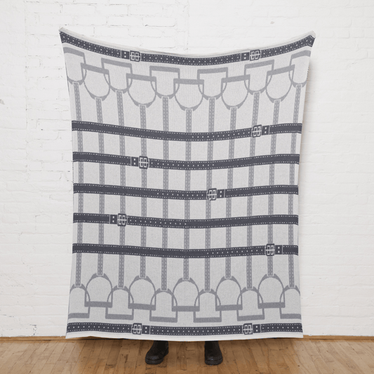 front view of an In2Green grey equestrian throw blanket. 