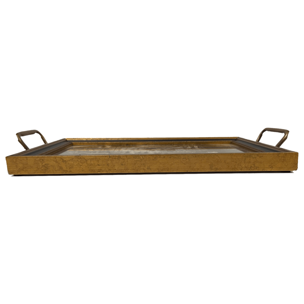 Side view of a wooden tray with brass handles at either end