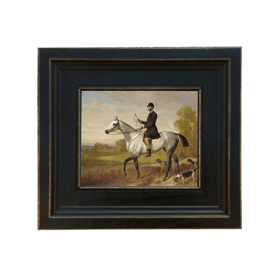 Framed print of a Man riding a horse in hunt gear with a hound at his heals