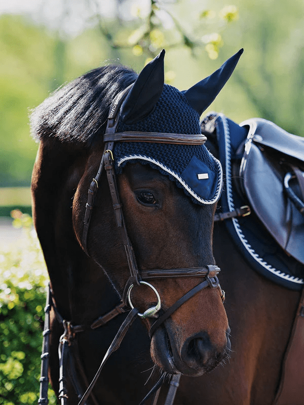 equestrian stockholm ear bonnet - midnight blue on horse